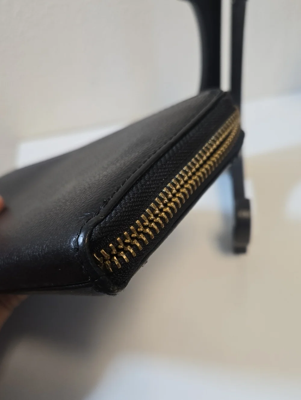 Fossil Black Leather Zip-Around Wallet with Gold Logo